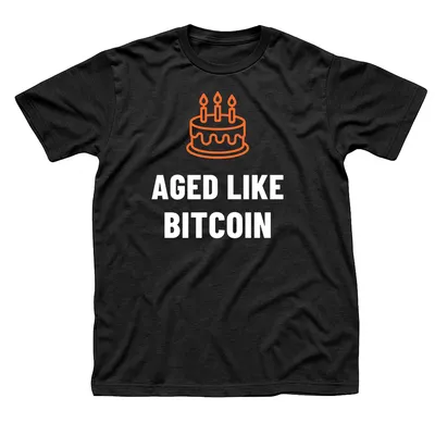 Black t-shirt with an orange birthday cake with three lit candles above Aged Like Bitcoin in white