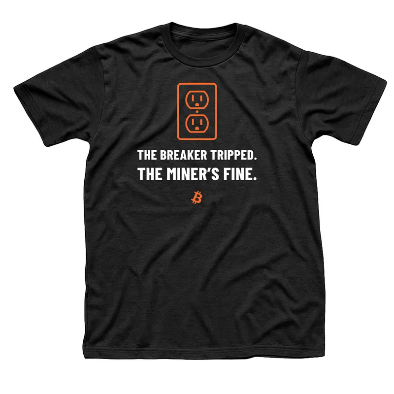 Black t-shirt with an orange wall outlet above The Breaker Tripped. The Miner's Fine. in white capitals and a small orange Bitcoin symbol below