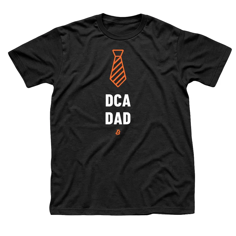 Black t-shirt with an orange striped necktie above DCA Dad in white and a small orange Bitcoin symbol