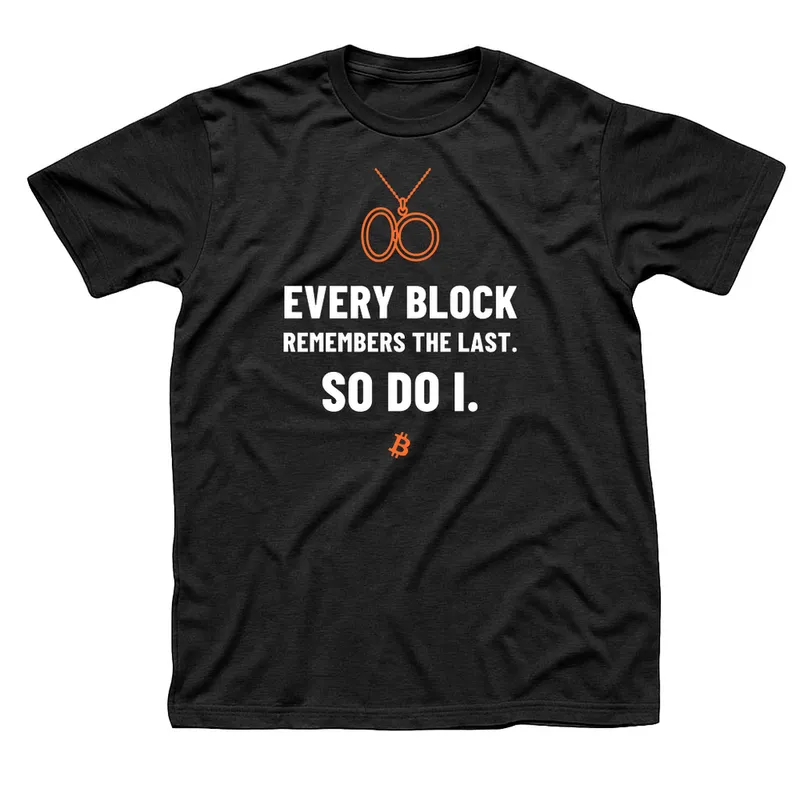 Black t-shirt with an orange outline open locket above Every Block Remembers the Last. So Do I. in white capitals and a small orange Bitcoin symbol below