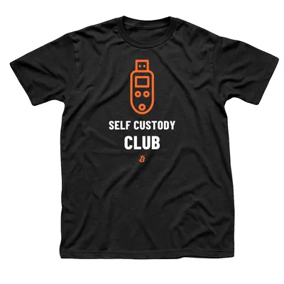 Black t-shirt with an orange hardware key device above Self Custody Club in white, with a small orange Bitcoin symbol below