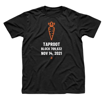 Black t-shirt with an orange carrot above Taproot, Block 709,632, Nov 14, 2021 in white capitals and a small orange Bitcoin symbol below