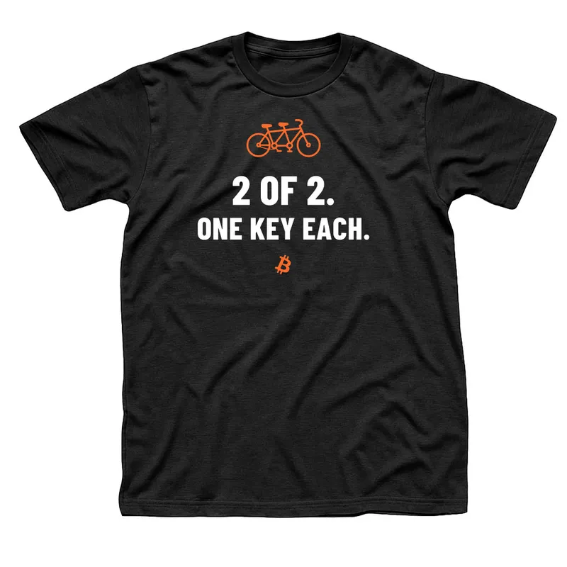 Black t-shirt with an orange outline tandem bicycle above 2 of 2, One Key Each in white capitals and a small orange Bitcoin symbol below