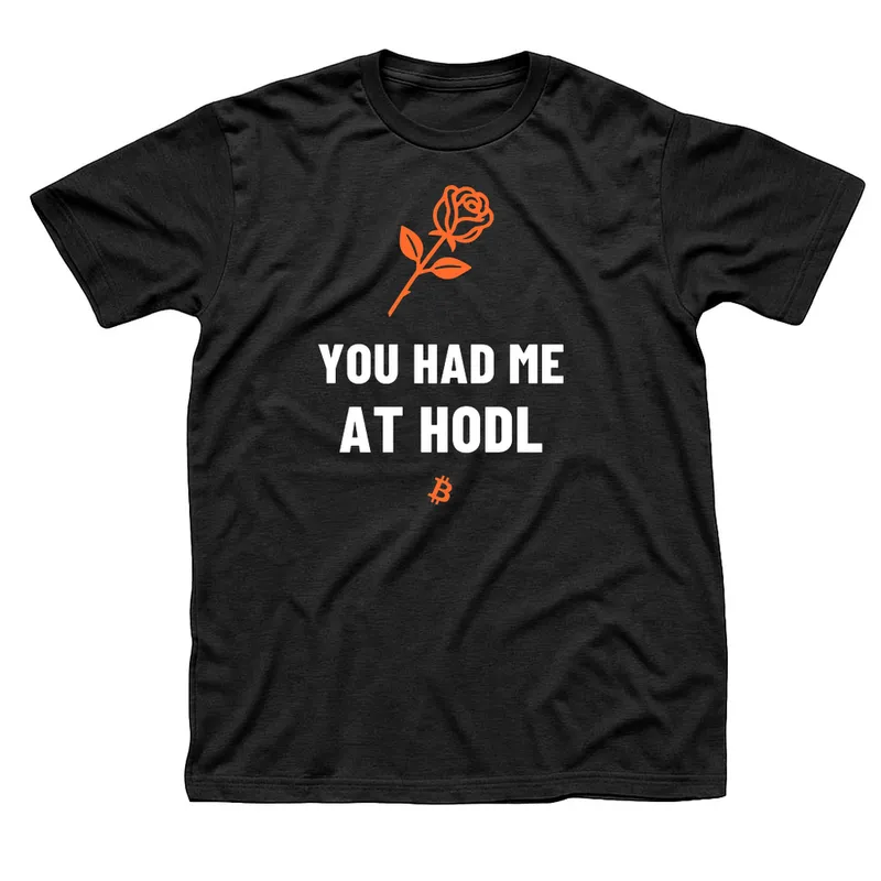 Black t-shirt with an orange long-stem rose above You Had Me at HODL in white and a small orange Bitcoin symbol